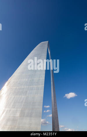 St. Louis, Mo USA- October 5 2016: Side view of the St. Louis Arch in a blue sky with some small clouds. Stock Photo