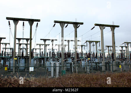 Electricity sub-station showing wires and pylons Stock Photo