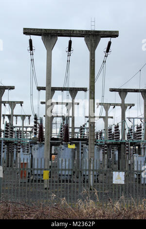 Electricity sub-station showing wires and pylons Stock Photo