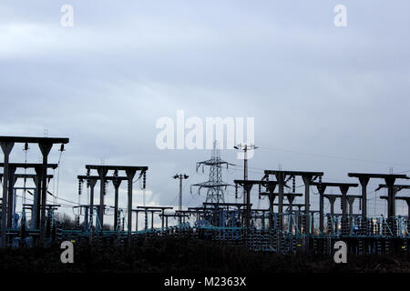 Electricity sub-station showing wires and pylons Stock Photo