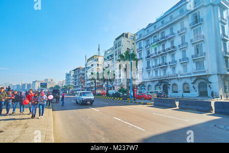 ALEXANDRIA, EGYPT - DECEMBER 17, 2017: The Corniche promenade is the popular walking zone among the tourists, locals and numerous students, living in  Stock Photo