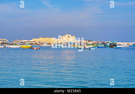 Qaitbay Castle and fishing boats in Eastern Harbor Alexandria Egypt ...