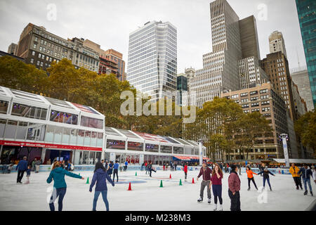 New York City Midtown Manhattan Ice rink in privately managed public park  Bryant Park Stock Photo