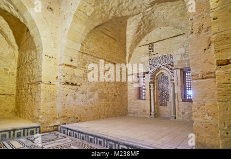 ALEXANDRIA, EGYPT - DECEMBER 17, 2017:  Interior of the mosque in Qaitbay Fort with old mihrab and stone mosaic floor, on December 17 in Alexandria. Stock Photo