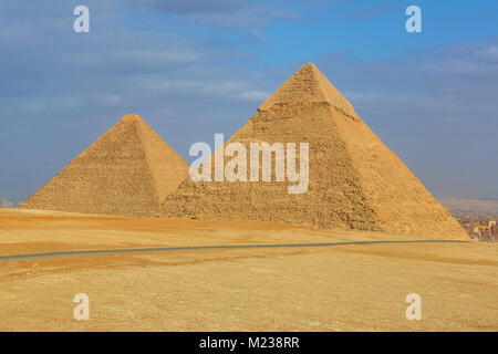 The Great Pyramid of Khufu (or Cheops)  and the Pyramid of Khafre (or Chephren) on the Giza Plateau, Cairo, Egypt Stock Photo