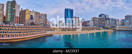 ALEXANDRIA, EGYPT - DECEMBER 17, 2017: Panorama of the Stanley beach with residential high-rises, shopping malls, restaurants and hotels on background Stock Photo