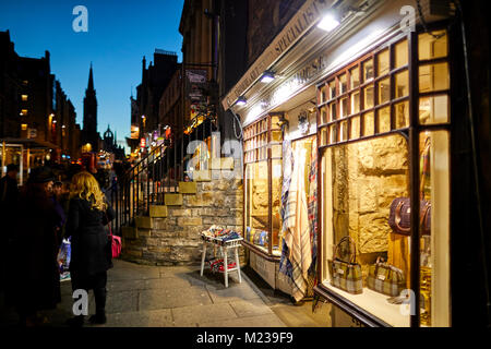 Edinburgh capital city of Scotland,  historic landmark royal mile gift shop selling tartan to tourists Stock Photo