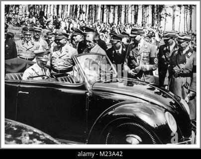 1930's ADOLF HITLER with DR. PORSCHE at the launch of 'the people's car' KDF VW Volkswagen Beetle prototype convertible air-cooled motorcar at Fallersleben Wolfsburg Germany May 1938 Stock Photo