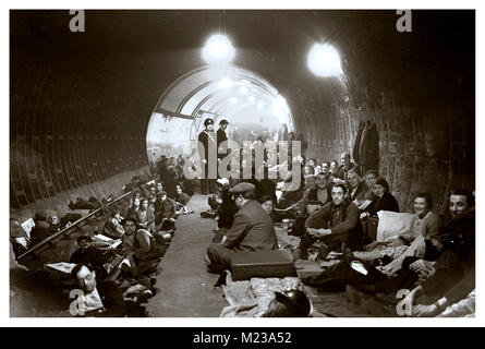 WW2 1940's Underground Station shelter London Blitz.. Tube station acting as a safe haven for London residents against sustained terror bombing by Nazi Germany. Adolf Hitler attempted concentrated aerial bombing of major population centres in England using the Nazi Luftwaffe as a tool to attempt to terrorise local UK resident population Stock Photo