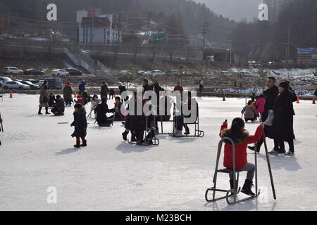 Hwacheon, Republic Of Korea. Jan. 22, 2018. Participants riding on the frozen Hwacheon River during the annual Hwacheon Sancheoneo Ice Festival Stock Photo