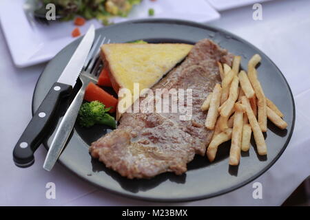 Grilled Beef steak on dish. Stock Photo