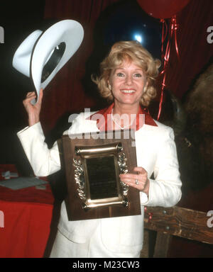 LOS ANGELES, CA - MAY 14:  Actress Debbie Reynolds attends Childrens Village event at Century Plaza Hotel on May 14, 1981 in Los Angeles, California. Photo by Barry King/Alamy Stock Photo Stock Photo