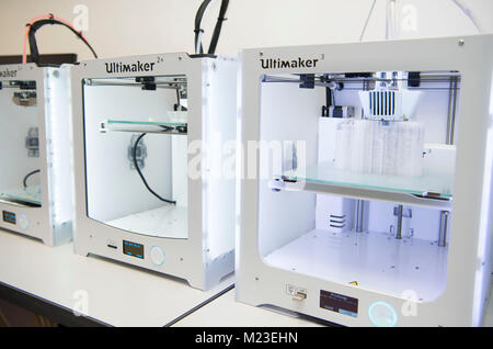 A Ultimaker 2 3d digital printer in use in a laboratory. Stock Photo