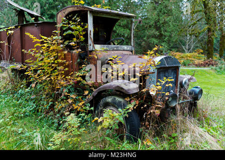 Old cars on a property in Deming, Washington, Whatcom County. Stock Photo