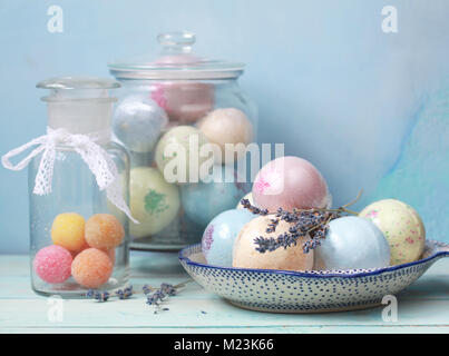 Handmade fragrant multicolored bath balls (bombs). Selection focus on some balls. Stock Photo