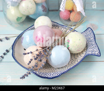 Handmade fragrant multicolored bath balls (bombs). Selection focus on some balls. Stock Photo