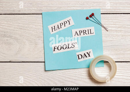 Happy April Fools Day phrase on wooden background Stock Photo