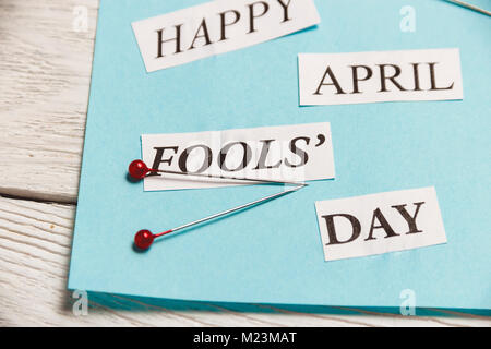 Happy April Fools Day phrase on wooden background Stock Photo