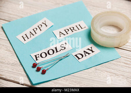 Happy April Fools Day phrase on wooden background Stock Photo