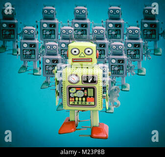 retro yellow robot leads the way Stock Photo