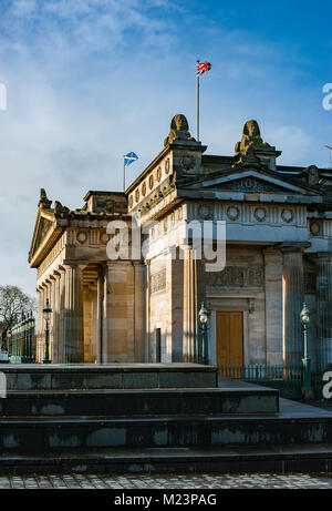 Scottish Saltire and British Union Jack flags on a top of Scottish National Gallery in Edinburgh Scotland Stock Photo