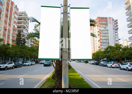 large two flag blank billboard on a street wall banners with room to add your own text Stock Photo