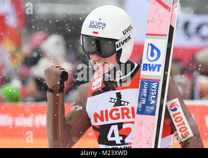 Willingen, Germany. 4th Feb, 2018. Piotr Zyla of Poland (3rd) celebrates after his second competition jump at the Ski Jumping World Cup in Willingen, Germany, 4 February 2018. Credit: Arne Dedert/dpa/Alamy Live News Stock Photo