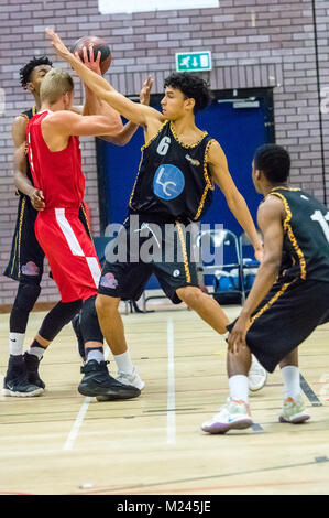 Brentwood, Essex, 4th February 2018 Essex Leopards player Dougie (centre)Bennett of Essex Leopards appears to strike a pose at the Basketball match at Brentwood credit Ian Davidson/Alamy Live News Stock Photo