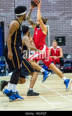 Brentwood, Essex, 4th February 2018 Joe Carter (12) of Sussex Bears, takes on the Essex Leopards defence  at the Basketball match at Brentwood credit Ian Davidson/Alamy Live News Stock Photo