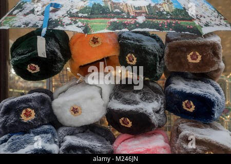 Moscow, Russia - February, 4, 2018: View of Soviet Army's winter hats in Moscow's downtown souvenir shop during abnormal snowfall in Moscow, Russia Credit: Nikolay Vinokurov/Alamy Live News Stock Photo