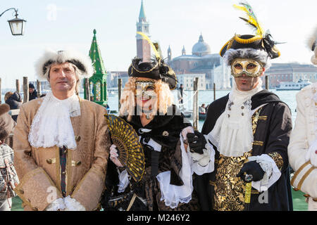 Venice, Veneto, Italy 4th February 2018.  The mayor of Venice, Luigi Brugnaro, (on the left) attending the Venice Carnval after the official opening of events in Piazza San Marco. Stock Photo