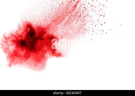 abstract red dust splattered on  white background. Red powder explosion on white background. Freeze motion of red particles splash. Stock Photo