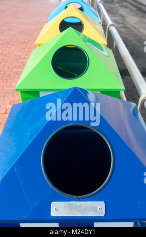 Colour coded waste bins for recycling plastic, paper, organic...on beach in Spain Stock Photo