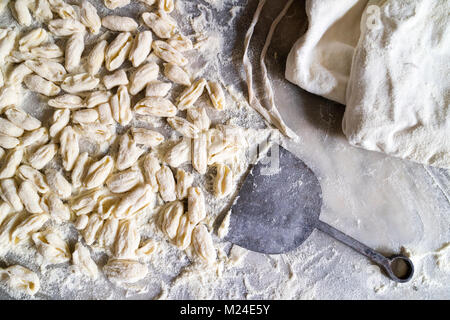 Cavatielli. Italian traditional fresh homemade pasta on a marble table Stock Photo