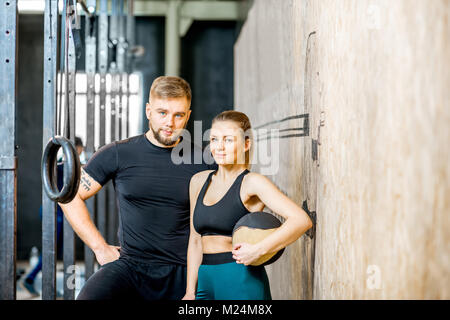 Sports couple portrait in the gym Stock Photo