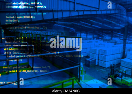 Artificial intelligence (AI) advisor in smart factory , machine and deep learning automation technology concept. Warehouse , blur blue coded programme Stock Photo