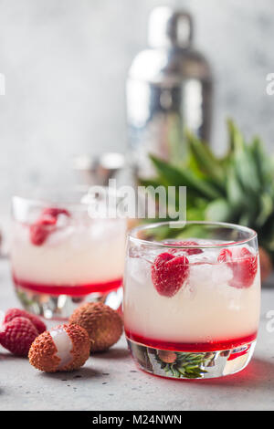 Cold lychee and raspberry cocktail Stock Photo