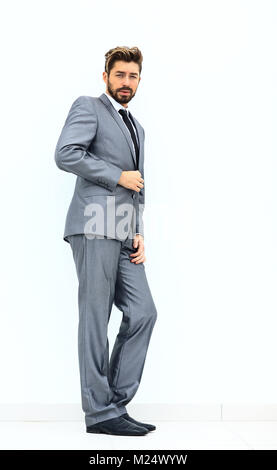 side view of an arrogant stylish man in suit Stock Photo