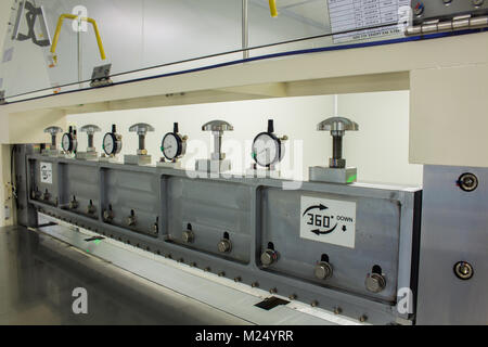 Using a Micrometer With machine, Or high resolution work and setup on machine for electronic industry. Stock Photo