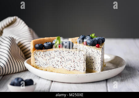Two slices of cake on white plate. Selective focus Stock Photo