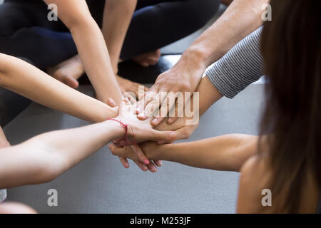 Smiling young professional looking at camera working with africa Stock Photo