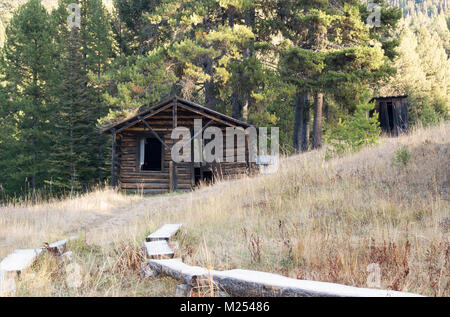 An old log cabin at the Garnet Ghost Town, on Bear Gulch, northwest of Drummond, Montana.  The mines in the area extracted primarily gold. Stock Photo