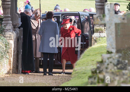 The Queen  receiving flowers after leaving St Peter and St Paul Parish Church ,West Newton near Sandringham, Norfolk ,on Sunday February 4th after  morning service. Stock Photo