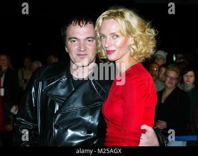 (dpa) - Hollywood director Quentin Tarantino and US actress Uma Thurman arrive for the European premiere of their film 'Kill Bill - Volume 1' in Berlin, 1 October 2003. In the film Uma Thurman plays a female assassin who is attacked on her wedding day by her boss, Bill. After five years she wakes up from coma and seeks revenge, leaving Bill for last. The second part of the film will be released in February or March 2004. | usage worldwide Stock Photo