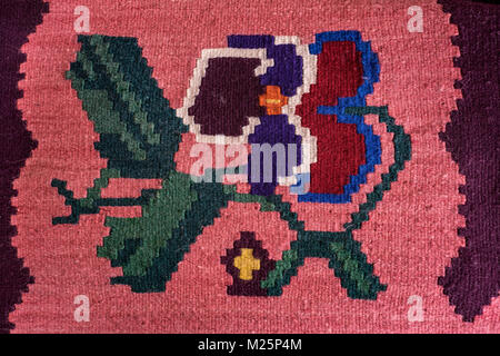 Colorful Serbian style rug surface and handmade carpet background Stock Photo