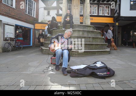 Busker with Guitar in Winchester Stock Photo