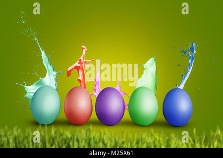 Colorful eggs with splashing paint Stock Photo