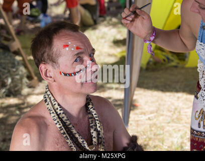 White male dressed in African aborigines  Stock Photo