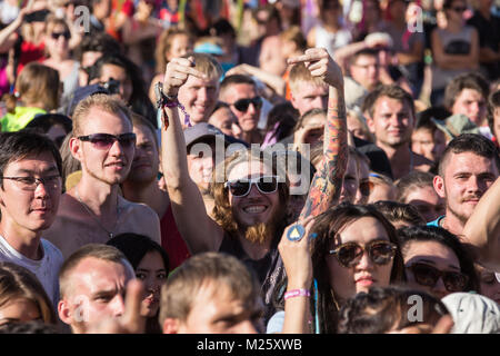 Cosmos Village, Almaty Province, Kazakhstan - 16 August 2015: The festival of ethnic music Forey, a lot of people gathers on this holiday to relax and have  fun. Ethnic open-air concert, where many people gathered. Crowd of blurred people Stock Photo