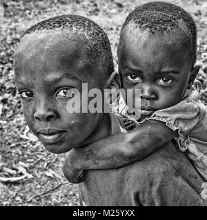 Children, boys and teens from Tanzania, Africa in black and white portrait style Stock Photo